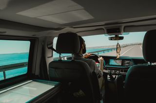 Man driving a VW California Ocean camper van