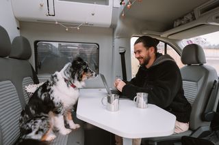 Dog and owner together in Grand California 600